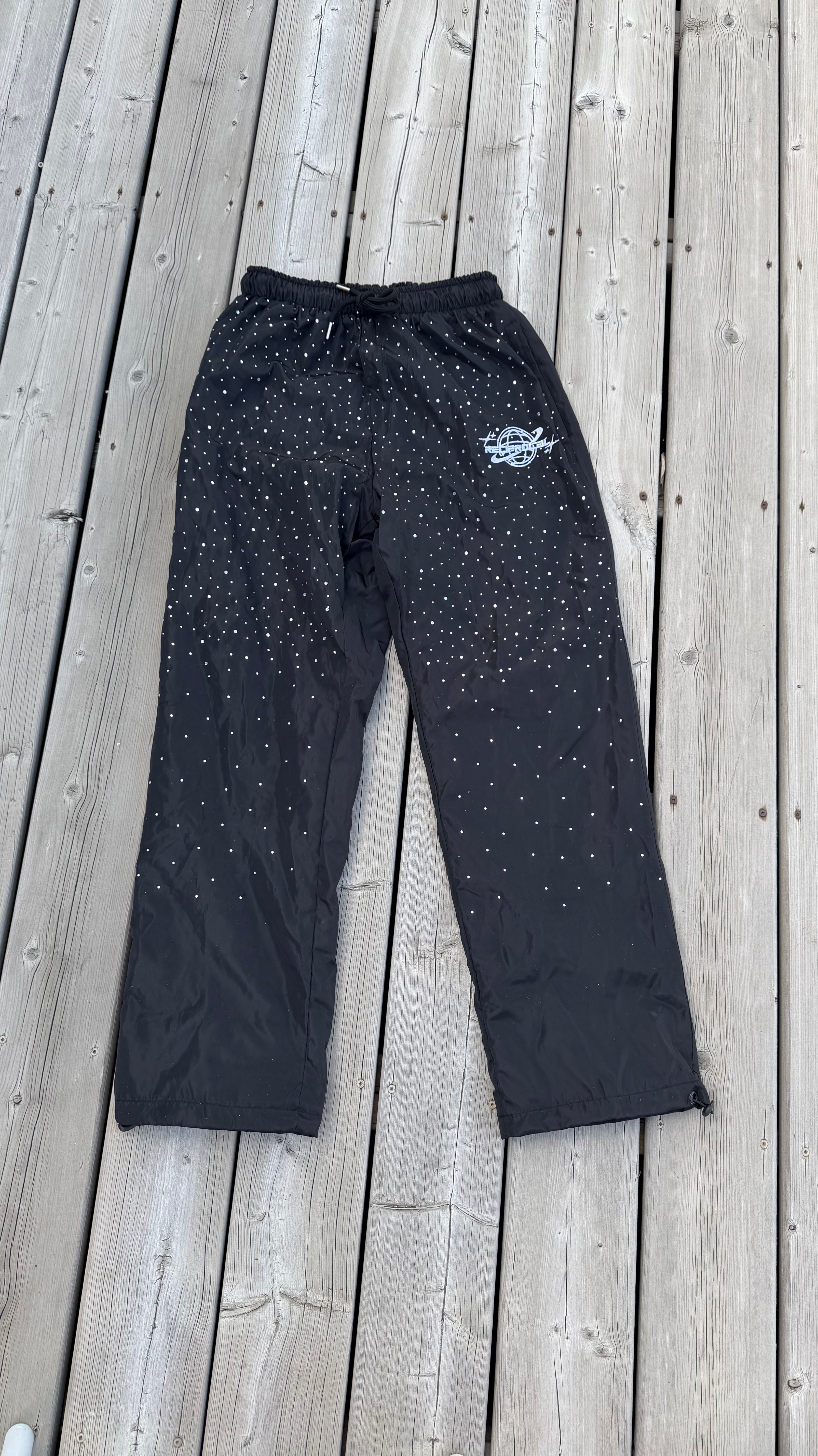 Black “Saturn” Windbreaker Pants
